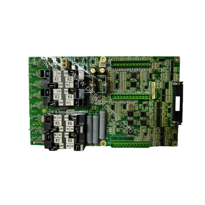 Figure 2: Close-up of the GE IS210AEAAH1B board highlighting the six insulated mounting holes and protective conformal coatin