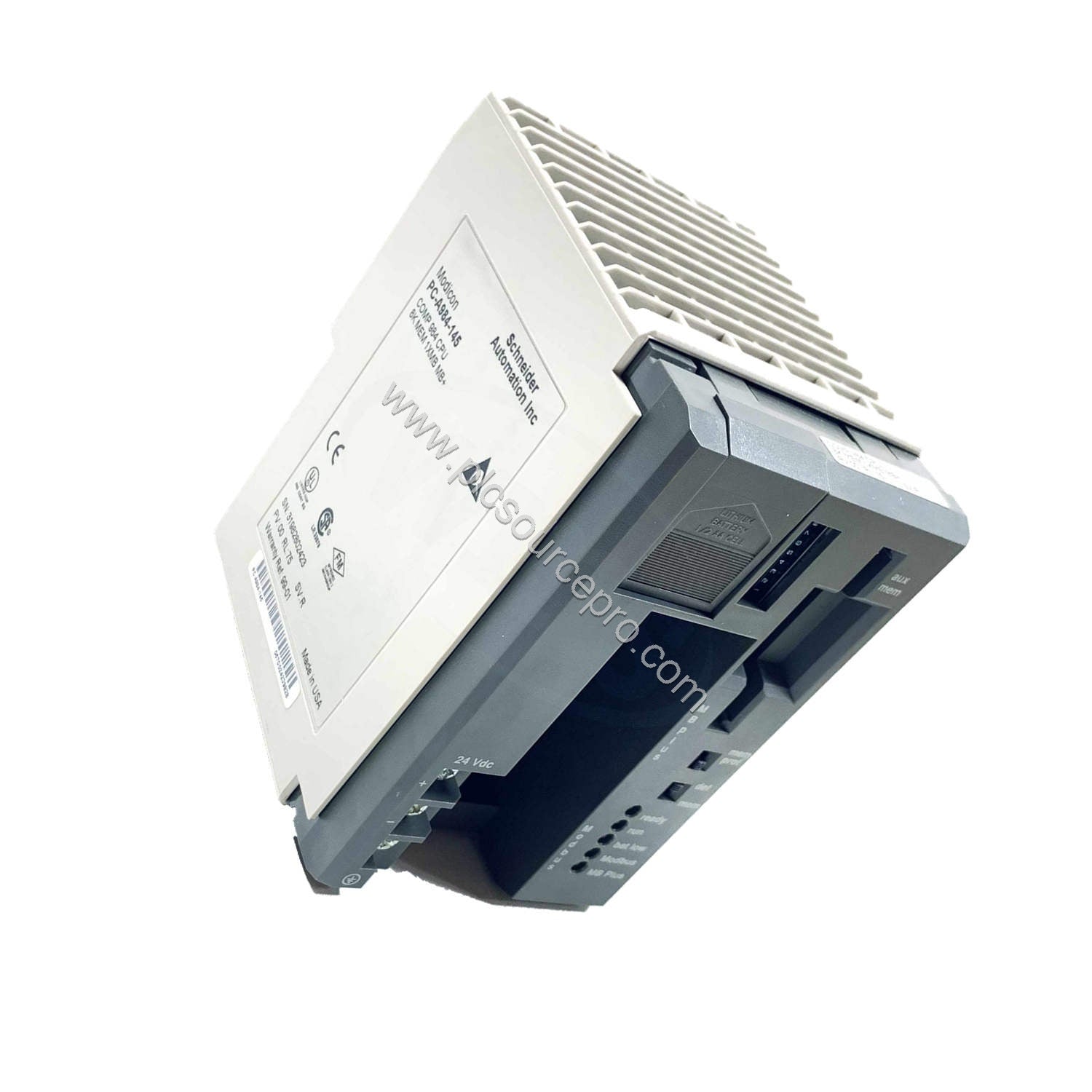 Figure 2: Side angle of the Schneider PC-A984-145 CPU module highlighting the dual Modbus communication ports and rack mounti