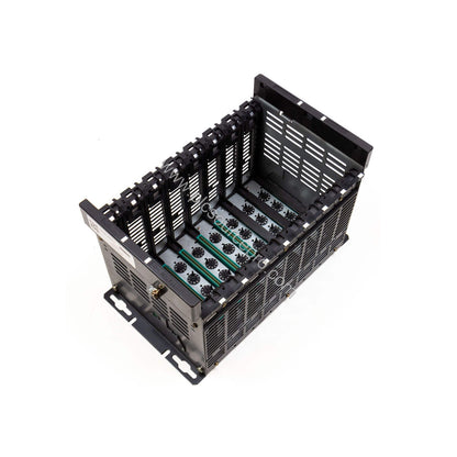 Figure 1: Front view of the Schneider TSXRKN5 short extension rack with five module slots mounted in an industrial enclosure.